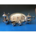 A five piece silver plated tea and coffee set on a tray