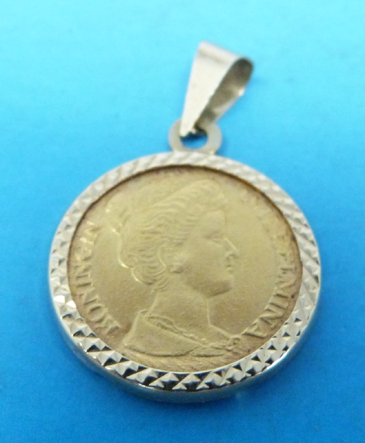 A Dutch 5 Guilder gold coin in yellow metal mount marked 585, weight 4.