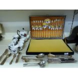 A cased canteen of silver plated cutlery,