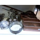 A collection of plated ware, glass claret jug, reproduction miner's lamp, warming pan,
