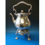 A large 19thC silver plated spirit kettle on ornate stand,