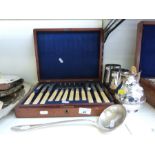 A collection of silver plate to include a large meat dish, jug, a canteen of cutlery,