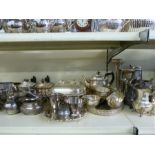 A collection of plated ware in two trays including Walker and Hall tea set, other tea sets,