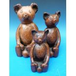 Three graduated moulded Stickland bears,