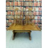 A pine kitchen table with two additional leaves and six matching chairs (L158 with added leaves