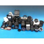 A quantity of SLR cameras and lenses etc, to include Praktica, Canon,