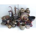 A collection of brass and metal items to include vases, lamps,