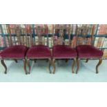 Four carved dining chairs