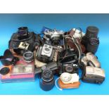 A quantity of vintage and other cameras to include Olympus OM-1N SLR