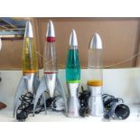 A collection of three Mathmos lava lamps and one other,