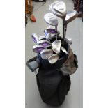 A set of golf clubs to include Cleveland irons, wedges,