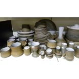 A Stoneware dinner and tea service, over 100 pieces,
