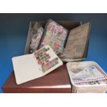 A box of loose stamps, all world stockbooks,