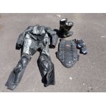 A motorcycle rider's leathers to include boots, jacket, trousers,