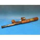 A WWI leather and brass telescope marked T.T & H Ltd 1918 no. 35650 Tel. sig. (Mk IV) also G.S.