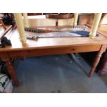 A pine kitchen table with single drawer to both ends (L150 x W87 x H76cm)