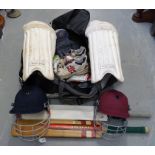 A quantity of cricketing equipment including two bats,