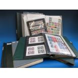 Four albums and a binder of France and Colonies stamps,