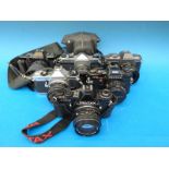 Six Pentax SLR cameras and lenses including Sportmatic with 1:1.4 /50 lens, ME Super 1:1.