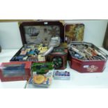 A quantity of collectables including matchboxes, tins, toy cars,