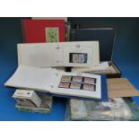 A large quantity of presentation packs, first day covers,