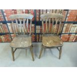 A pair of 19thC elm seated chairs