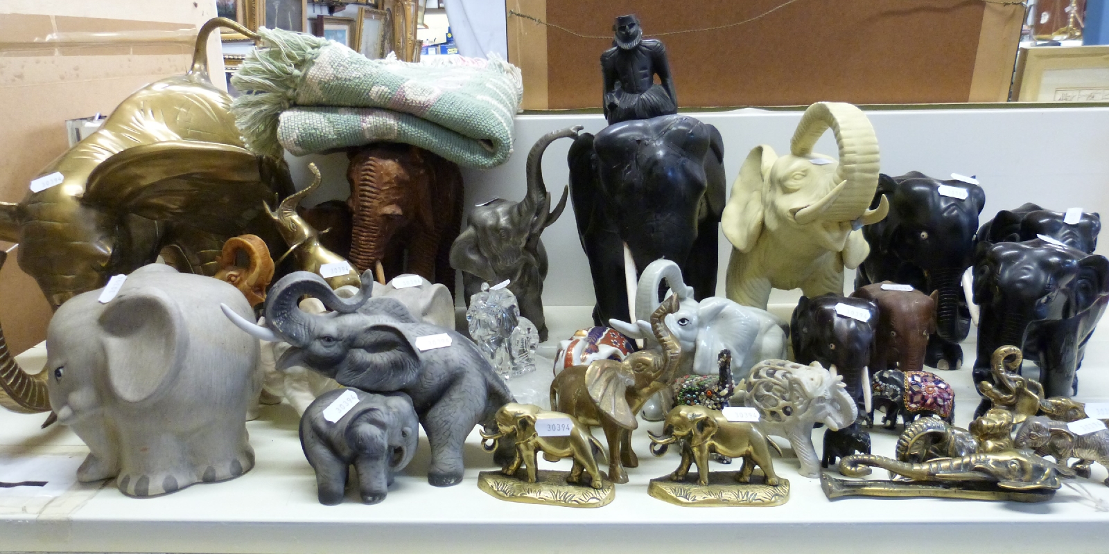 A collection of elephants including ebony, wooden,