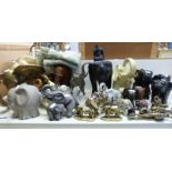 A collection of elephants including ebony, wooden,