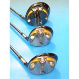 A set of three Taylormade R7 Superquad golf clubs, a driver, three wood and 5 wood,