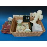 A basket of items from Highgrove shop to include table mats, aprons, peg bag in Rothesay Tartan,