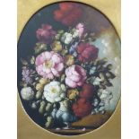 A pair of oils on canvas of flowers in oval mounts and gilt frames (50cm x 40cm)