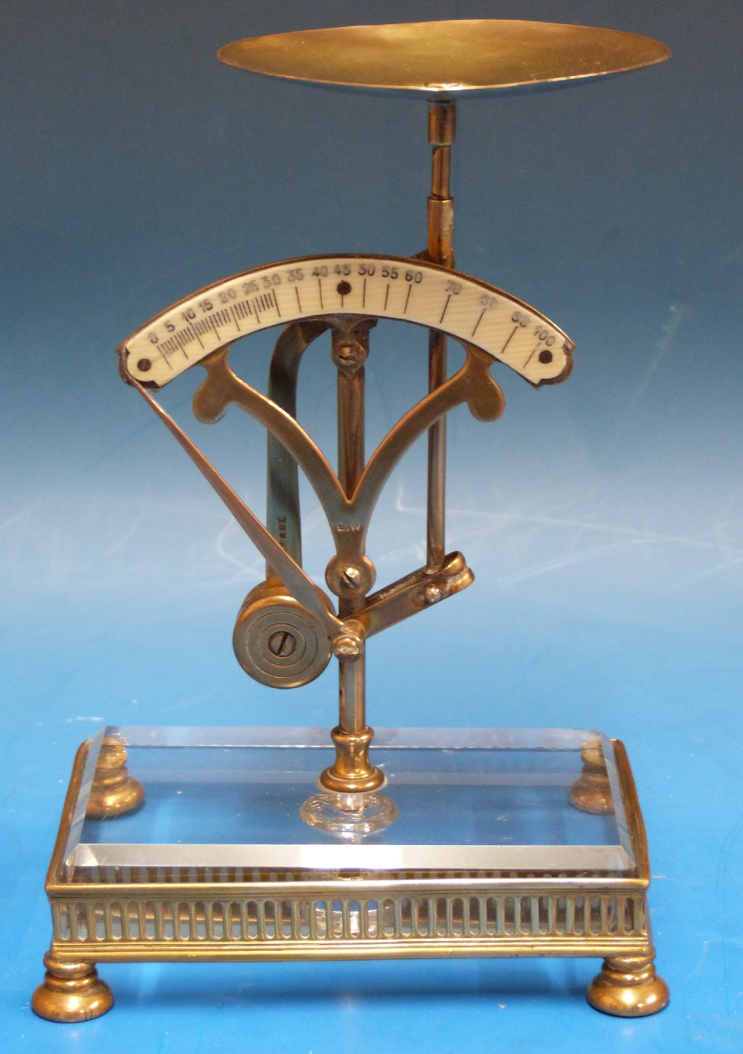 A set of pendulum type letter scales, with ivorine scale calibrated up to 100, marked E.W.