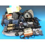 A collection of vintage cameras to include Yashica, some in original cases, together with spares,