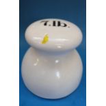 A 7lb bun shaped ceramic weight