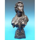 A bronze bust of a lady on stepped base,