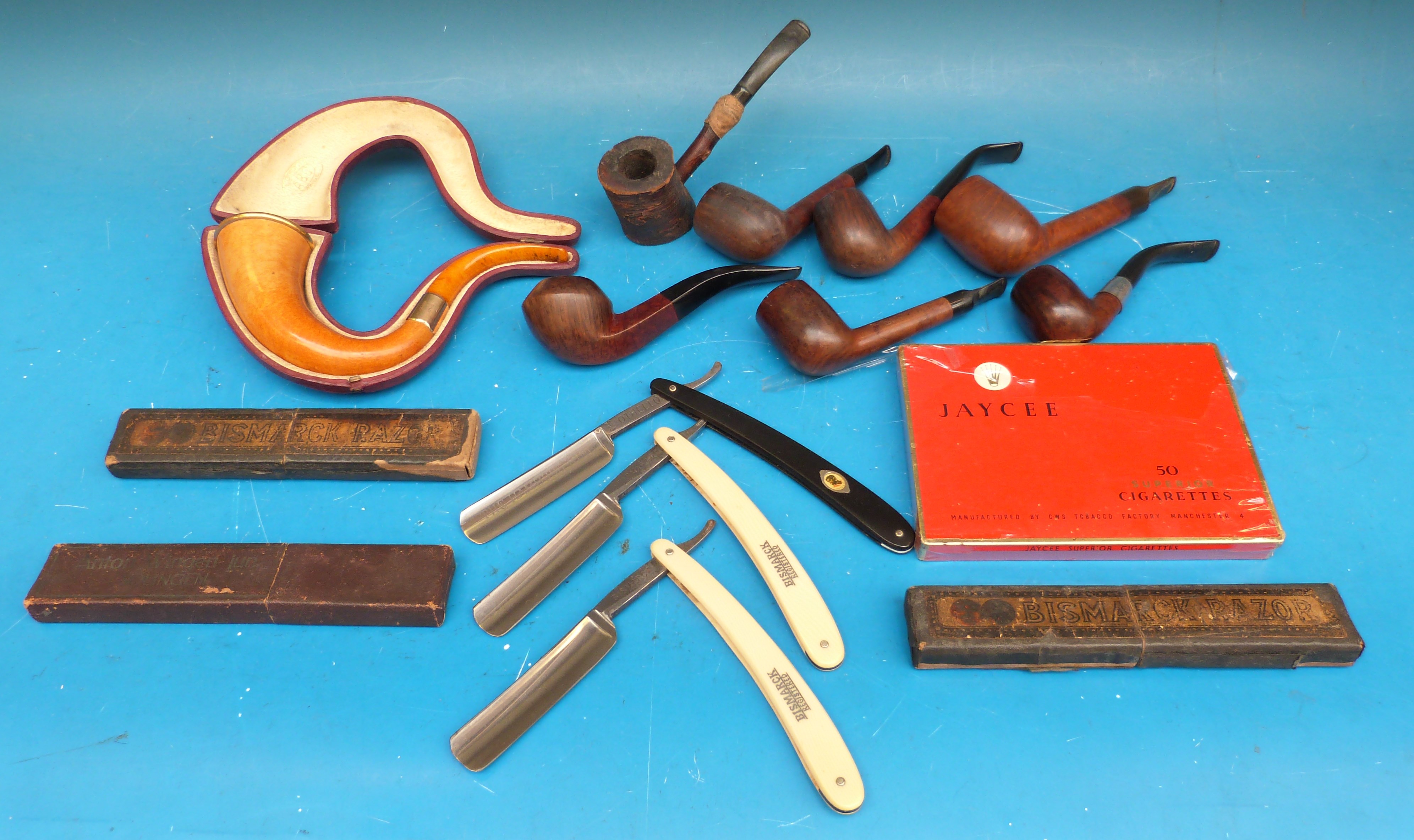 A collection of Briar pipes to include Colonel Henry Fraser Lovat,