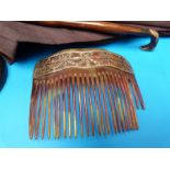 A 9ct gold mounted horn hair comb,