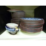 A collection of Royal Worcester dinnerware in Royal Lily pattern comprising 13 dinner plates,