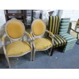 Two limed wooden armchairs together with seven various other chairs