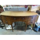 A mahogany inlaid bow-fronted sideboard in the Georgian style (H88 x L153 x W61cm)