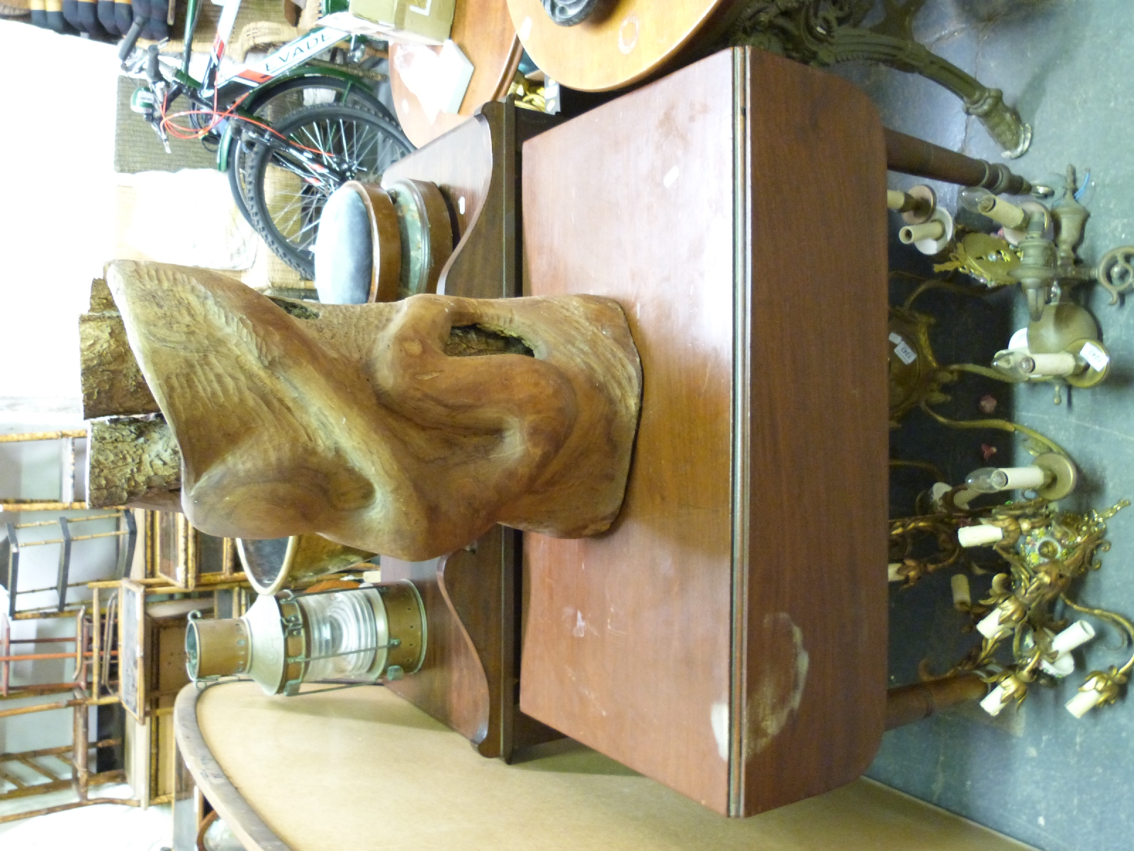 A mahogany Pembroke table and a wooden sculpture