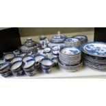 A large quantity of Booths "Old Willow Pattern" blue and white tea and dinner ware (approximately