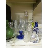 A collection of glassware including vases