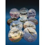 A set of ten Doulton /Coalport wall plates with scenes of war planes (boxed with certificates)