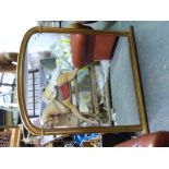 An ornate gilt over-mantel mirror (H123 x W110cm)
