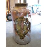 A large glass apothecary jar with gilt label "Rimmington and Sons"