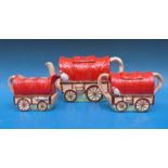 A 1930's wagon train tea set comprising teapot,