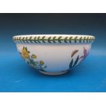 A Portmeirion mixing or fruit bowl with blue passion flower decoration
