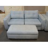 A blue suede three-seater sofa and matching ottoman (length 305cm)