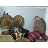 A quantity of fans, various cushions, two wooden carriers and various globes etc.